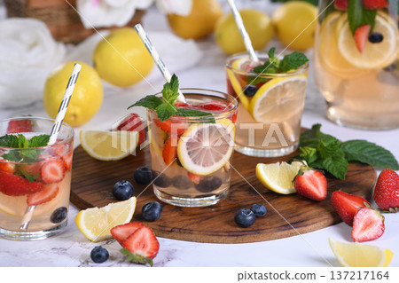 Lemonade with strawberries, blueberries and mint Lemonade with strawberries, blueberries and mint 137217164