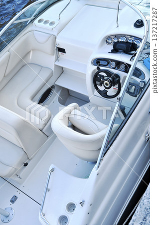 beautiful white small trip yacht on channel water at sunny day. close up beautiful white small trip yacht on channel water at sunny day. close up 137217287