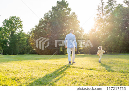 Father child. Parent and child spending quality time outdoors. Father child. Parent and child spending quality time outdoors. 137217733