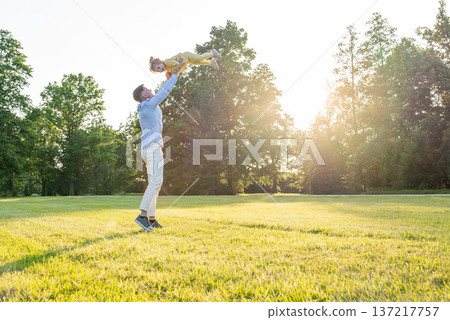 Father child. Parent and child spending quality time outdoors. Father child. Parent and child spending quality time outdoors. 137217757