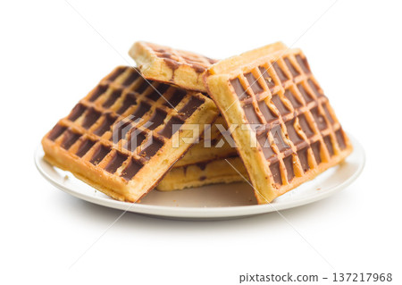 Sweet waffles with chocolate isolated on white background. 137217968