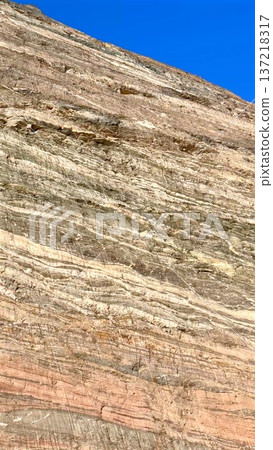 Sunbaked Rock Formations With Detailed Layers. Timeworn Sandstone Sculptures Displaying Detailed Strata And Nuanced Shadows That Highlight Their Natural Beauty And Textures 137218317