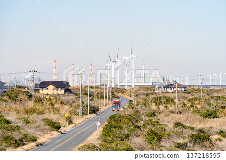 Seaside road, windmills and industrial area in Hasaki, Kamisu City 137218595