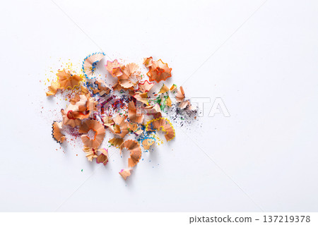 Wooden colored pencil sharpening shavings pile on white isolated background, top view, flat lay, copy space 137219378