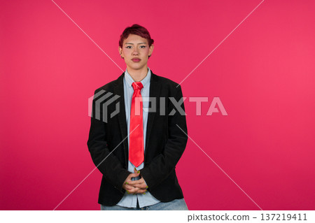Young person expressing individuality in business casual attire 137219411