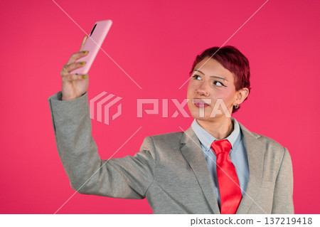 Stylish person taking personal selfie with smartphone 137219418
