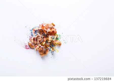 Wooden colored pencil sharpening shavings pile on white isolated background, top view, flat lay, copy space Wooden colored pencil sharpening shavings pile on white isolated background, top view, flat lay, copy space 137219884