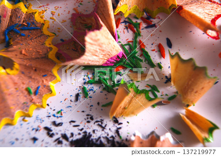Wooden colorful pencil sharpening shavings closeup as abstract background. Art and education Wooden colorful pencil sharpening shavings closeup as abstract background. Art and education 137219977