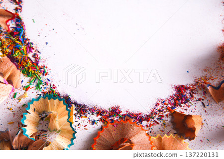 Wooden colorful pencil sharpening shavings, on white isolated background, top view, flat lay, copy space Wooden colorful pencil sharpening shavings, on white isolated background, top view, flat lay, copy space 137220131