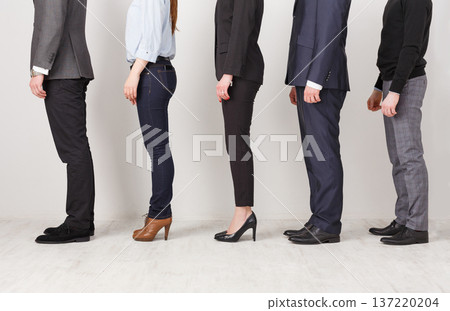 Unrecognizable business people profile in office. Professional team posing for photo, subordination concept, crop 137220204