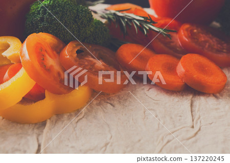 Cooking healthy vegetarian food background. Fresh organic vegetables on pita bread, natural food, close up. Cooking healthy vegetarian food background. Fresh organic vegetables on pita bread, natural food, close up. 137220245