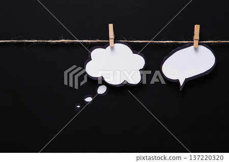 Blank speech bubble for presenting creative idea or business solution on black studio background, copy space, objects, nobody 137220320