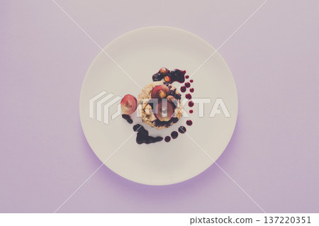 Healthy breakfast, dieting and detox concept - wholegrain fresh oatmeal porridge on bright blue background, top view 137220351