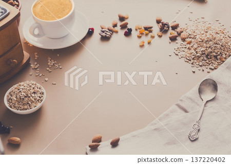 Healthy breakfast, dieting and detox concept - coffee, oat and nuts. Still life, copy space Healthy breakfast, dieting and detox concept - coffee, oat and nuts. Still life, copy space 137220402