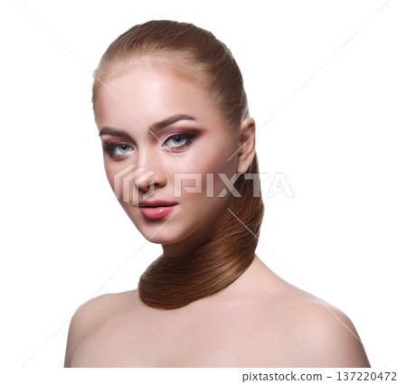 Beauty model isolated on white background, fashion shooting. Woman with makeup, perfect skin and hair posing to camera at studio Beauty model isolated on white background, fashion shooting. Woman with makeup, perfect skin and hair posing to camera at studio 137220472