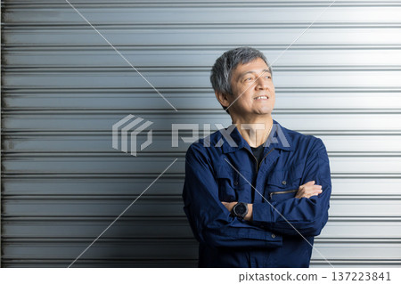Senior man in work clothes 137223841