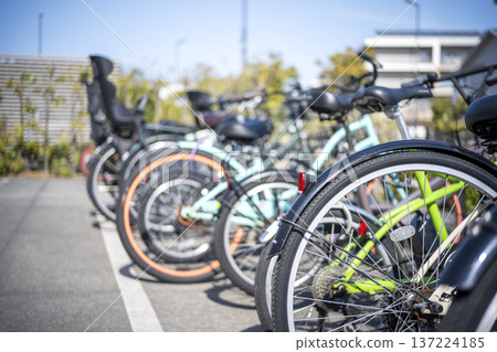 Colorful bicycles lined up in the bicycle parking lot in the park Bicycle parking lot Bicycle 137224185