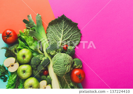 Diet, detox and healthy food concept - top view flat lay of fresh organic raw vegetables on abstract bright background. Ingredients for salad 137224410