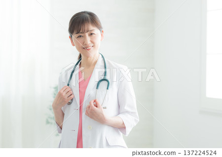 Middle women in white coat 137224524