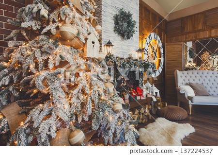 Beautiful christmas interior. Warm room with fireplace, decorated christmas tree, lots of presents and huge clock on wooden wall. Cozy home for winter holidays, copy space, side view Beautiful christmas interior. Warm room with fireplace, decorated christmas tree, lots of presents and huge clock on wooden wall. Cozy home for winter holidays, copy space, side view 137224537