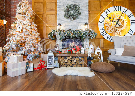 Beautiful christmas interior. Warm room with fireplace, decorated christmas tree, lots of presents and huge clock on wooden wall. Cozy home for winter holidays, copy space Beautiful christmas interior. Warm room with fireplace, decorated christmas tree, lots of presents and huge clock on wooden wall. Cozy home for winter holidays, copy space 137224587