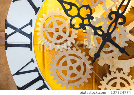 Huge fairy like clock with watch mechanism. Magical golden clock dial closeup Huge fairy like clock with watch mechanism. Magical golden clock dial closeup 137224774