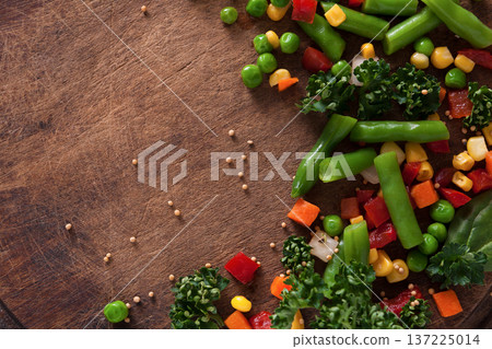Healthy food, vegetarian nutrition. Organic vegetable mix on wooden table, close-up. Diet eating Healthy food, vegetarian nutrition. Organic vegetable mix on wooden table, close-up. Diet eating 137225014