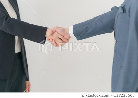 The hand of the businessman shaking hands The hand of the businessman shaking hands 137225503