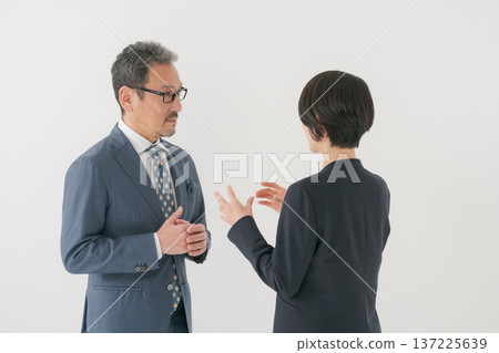 Two businessmen discussing 137225639