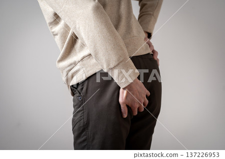 Men with buttock pain, hemorrhoids, constipation, diarrhea, bowel movements, body parts, cut parts 137226953
