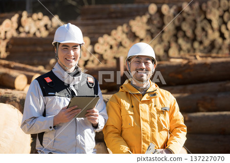 Smiling faces of people working in primary industries such as forestry, and images of wood materials for real estate. 137227070