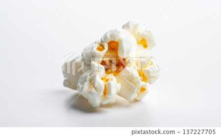 Popped popcorn placed in the center of a plain white background 137227705