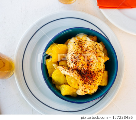 Spanish fried potatoes patatas bravas 137228486
