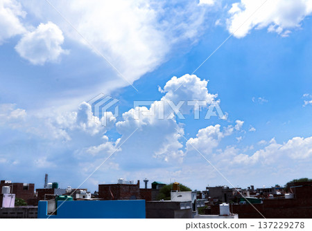 Blue Sky with White Clouds over Urban Cityscape 137229278