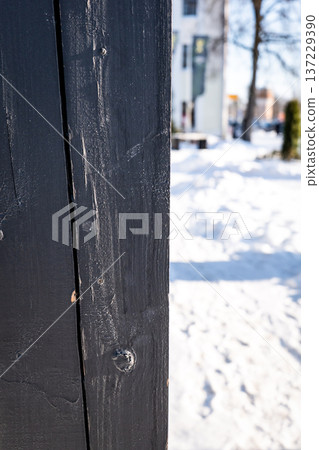 Weathered Wooden Post Close Up In Urban Outdoor Winter Setting 137229390