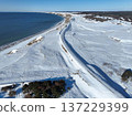 Winter aerial view of the Nemuro Main Line near Cape Ochiishi, overlooking the Pacific coast 137229399