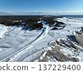 Winter aerial view of the Nemuro Main Line near Cape Ochiishi, overlooking the Pacific coast 137229400