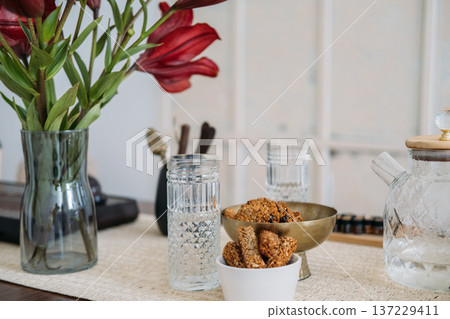 Healthy breakfast. Oatmeal bowl. Transparent glass with tasty wholegrain snack rich in protein fiber calcium flower placed on defocused. Healthy breakfast. Oatmeal bowl. Transparent glass with tasty wholegrain snack rich in protein fiber calcium flower placed on defocused. 137229411