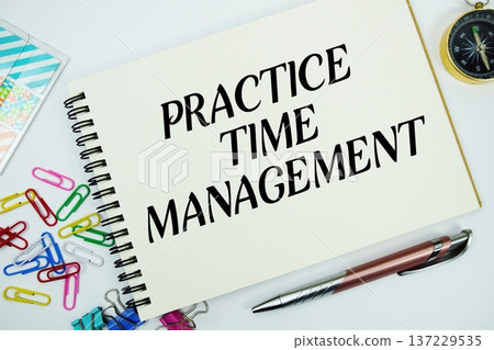 Practice Time Management text message written on notepad with stationery flat lay on white background Practice Time Management text message written on notepad with stationery flat lay on white background 137229535