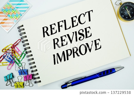 Reflect, Revise, Improve text message written on notepad with stationery flat lay on white background Reflect, Revise, Improve text message written on notepad with stationery flat lay on white background 137229538