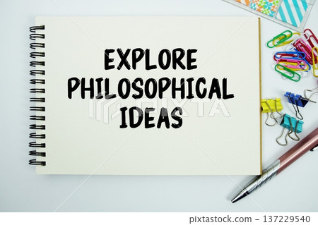 Explore Philosophical Ideas text message written on notepad with stationery flat lay on white background Explore Philosophical Ideas text message written on notepad with stationery flat lay on white background 137229540