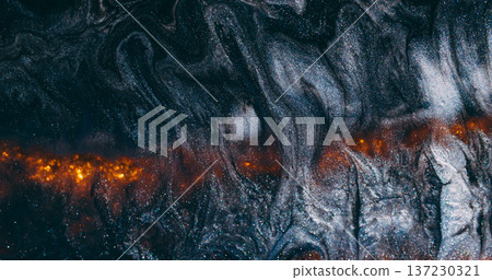 Glitter wave. Paint lava. Black ash shimmering emulsion spill on wet gray background. Hot orange glow line abstract blur volcanic. 137230321