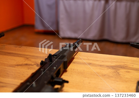Police rifle on shooting range table. Combat training for law enforcement officers. Using weapons for good purposes to protect the public. Police weapon on table. Tactical assault gun 137233460