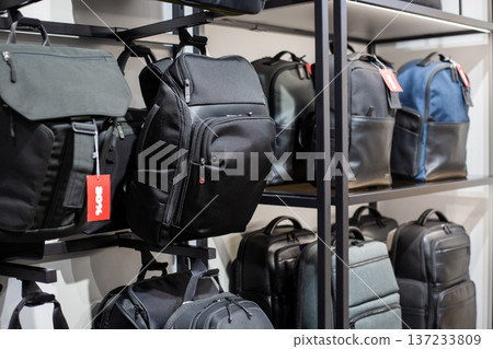 Wide selection of backpacks in store. Find the perfect backpack for you. Simple accessory with variety of features and designs. Huge variety of backpacks to suit every taste 137233809