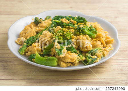 Stir-fried rape blossoms and eggs Stir-fried rape blossoms and eggs 137233990