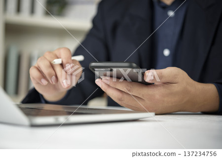 Man hands typing touchscreen cellphone browsing web reading message. Modern entrepreneur remote work job wireless gadget electronic connection commerce business strategy. Man hands typing touchscreen cellphone browsing web reading message. Modern entrepreneur remote work job wireless gadget electronic connection commerce business strategy. 137234756