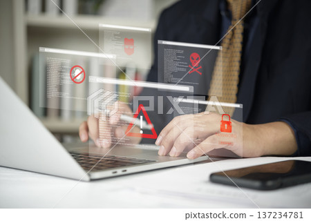 Cybersecurity threat, hacker attack concept. Businessman using laptop, system alert, data breach warning. Virtual interface show malware, virus, password risk. Internet security failure. Cybersecurity threat, hacker attack concept. Businessman using laptop, system alert, data breach warning. Virtual interface show malware, virus, password risk. Internet security failure. 137234781