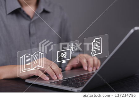 Man hand using laptop for e-learning, online education. Virtual interface icon workflow: knowledge book, webinar course, get certificate. Skill development, employee training, qualification concept. Man hand using laptop for e-learning, online education. Virtual interface icon workflow: knowledge book, webinar course, get certificate. Skill development, employee training, qualification concept. 137234786