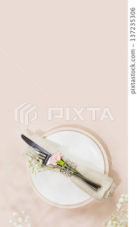 Rustic Wedding Table Setting With Knife And Fork Wrapped In Linen On Plate Rustic Wedding Table Setting With Knife And Fork Wrapped In Linen On Plate 137235306