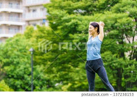 Middle women stretching 137238153